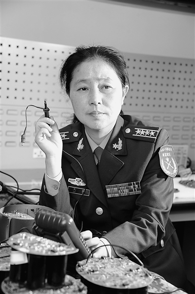工作中的劉茹臉上總是流露出這樣的神態(tài)：平和、專注、堅(jiān)毅